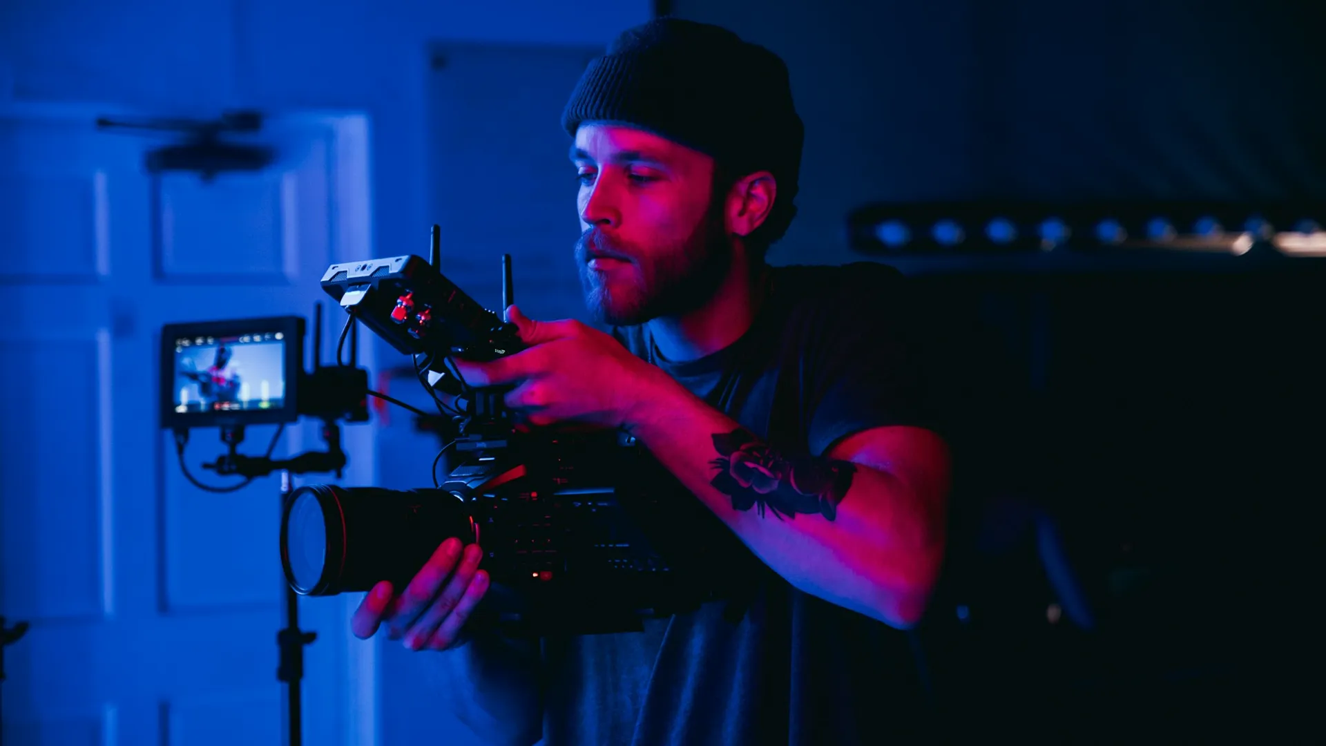 Videographer filming with a cinema camera